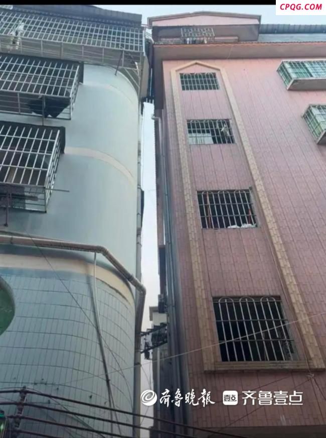 广州震后两栋楼贴在一起 安全隐患引关注